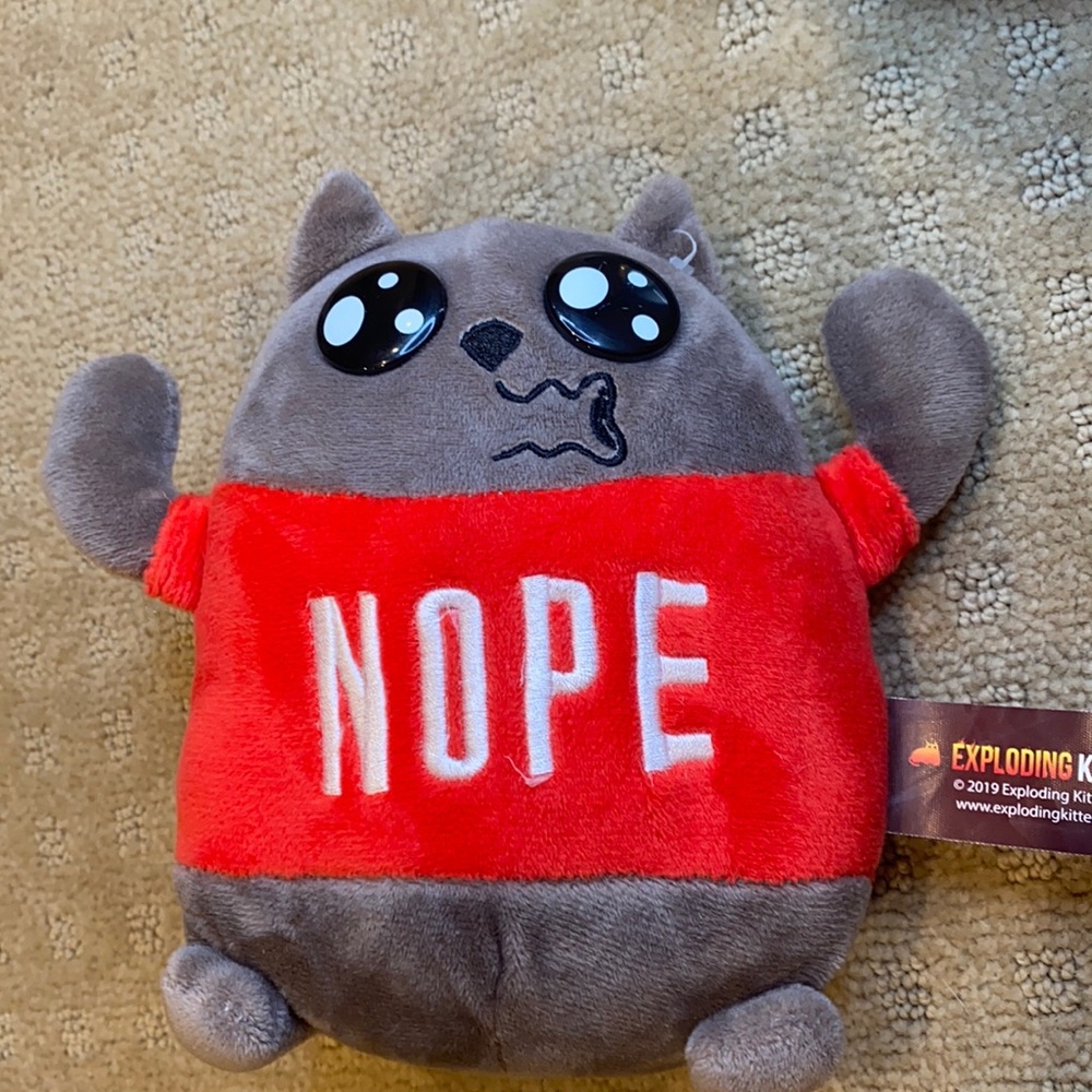 Small “nope” shirt cat